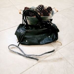 Black leather purse with adjustable straps